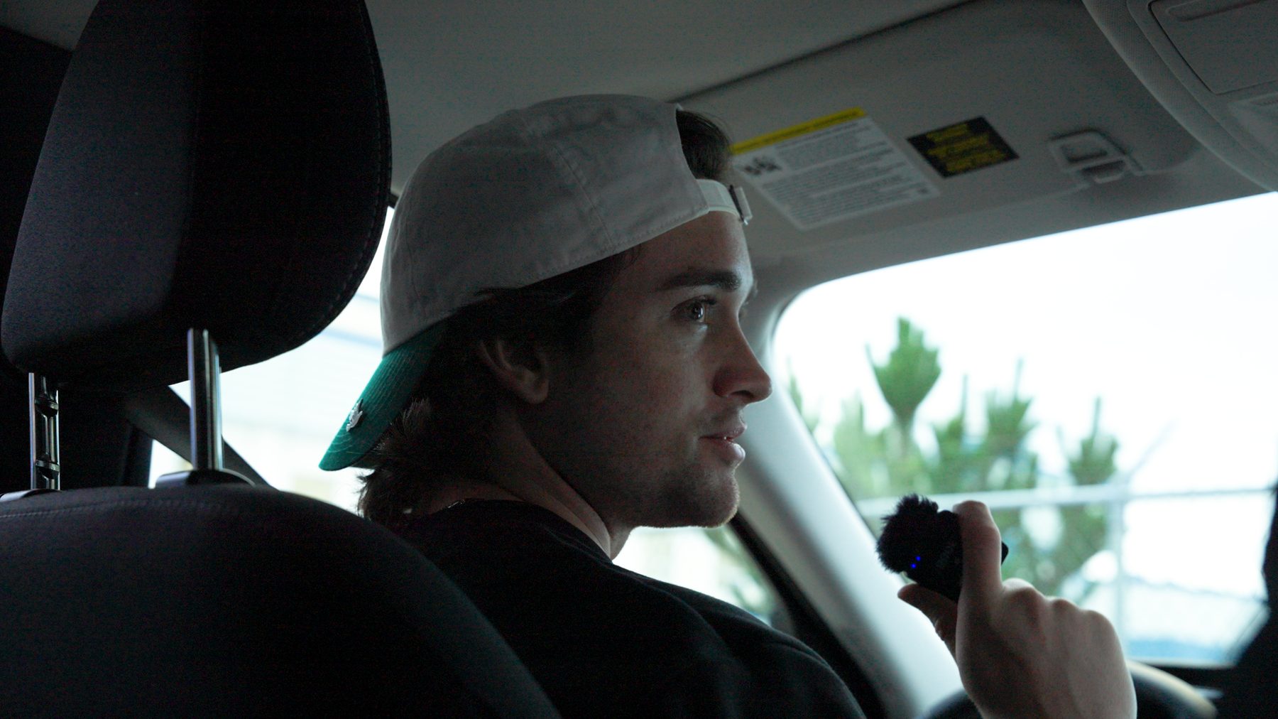 Gavin Barry recording audio in the field